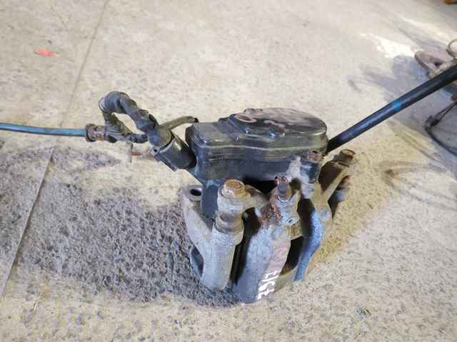 Zacisk hamulcowy tylny lewy Mazda CX-9 TC