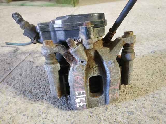 Zacisk hamulcowy tylny lewy Mazda CX-9 TC