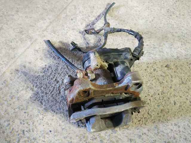 Zacisk hamulcowy tylny lewy Mazda CX-9 TC