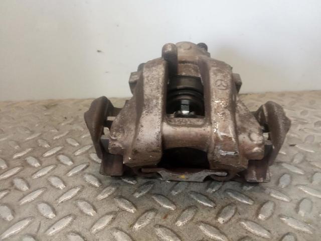 Zacisk hamulcowy tylny lewy 0024202583 MERCEDES