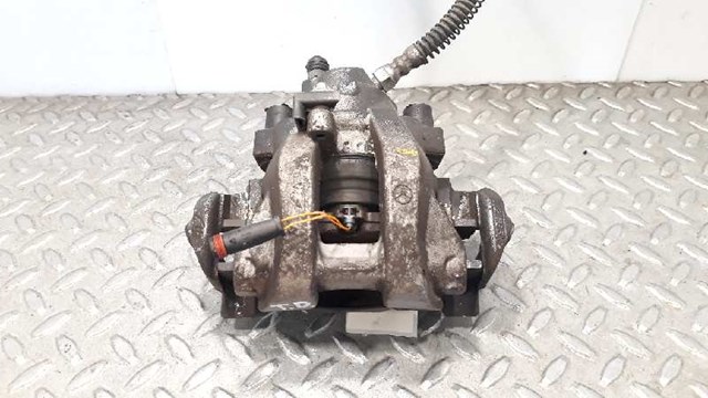Zacisk hamulcowy tylny prawy 0024202683 MERCEDES