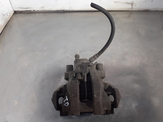 Zacisk hamulcowy tylny prawy 0024202683 MERCEDES