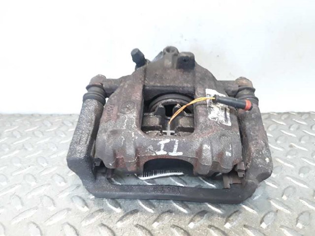 Zacisk hamulcowy tylny lewy 0034207183 MERCEDES