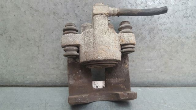 Zacisk hamulcowy tylny lewy Jeep Grand Cherokee