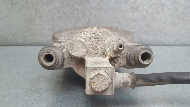 Zacisk hamulcowy tylny lewy Jeep Grand Cherokee