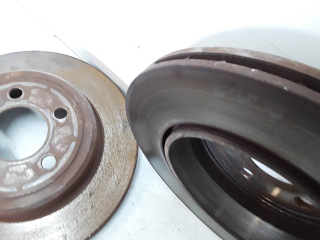 Tarcza hamulcowa tylna 04779209AE CHRYSLER