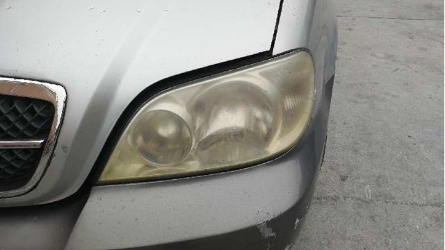 Reflektor lewy 0K54E51040A HYUNDAI