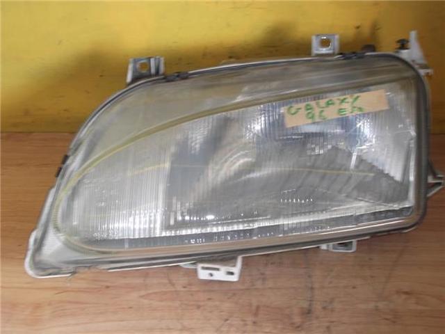 Reflektor lewy 1005728 FORD