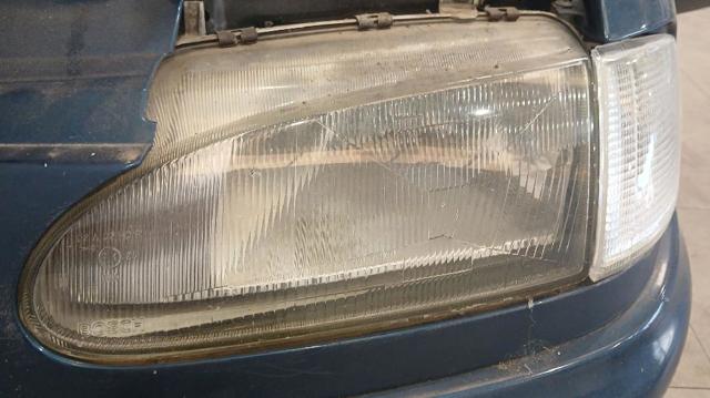 Reflektor lewy 1005728 FORD