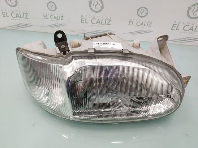 Reflektor prawy 1058189 Ford