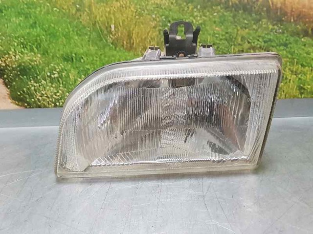 Reflektor lewy 1062430 FORD