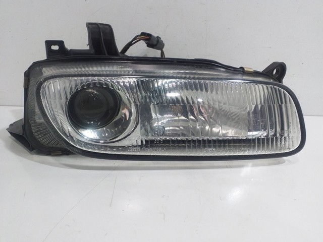 Reflektor lewy Mazda 323 BA