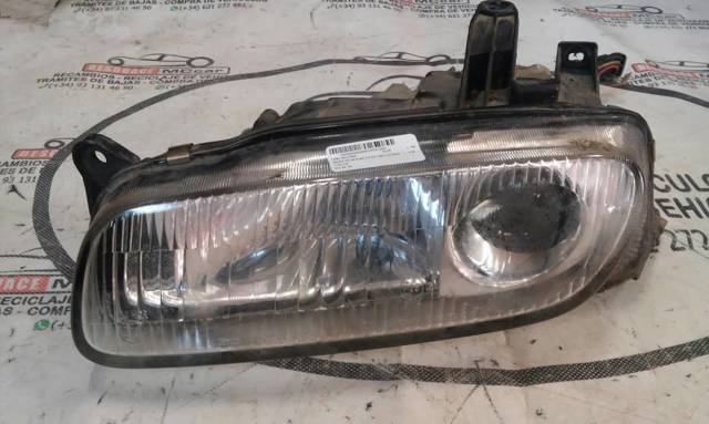 Reflektor lewy Mazda 323 BA