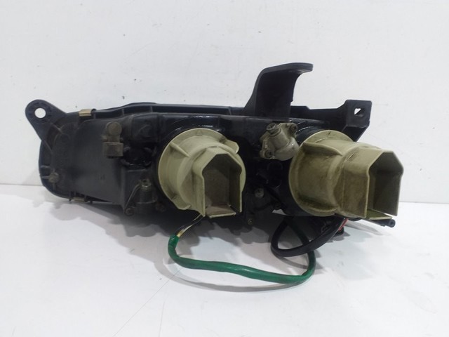 Reflektor lewy Mazda 323 BA