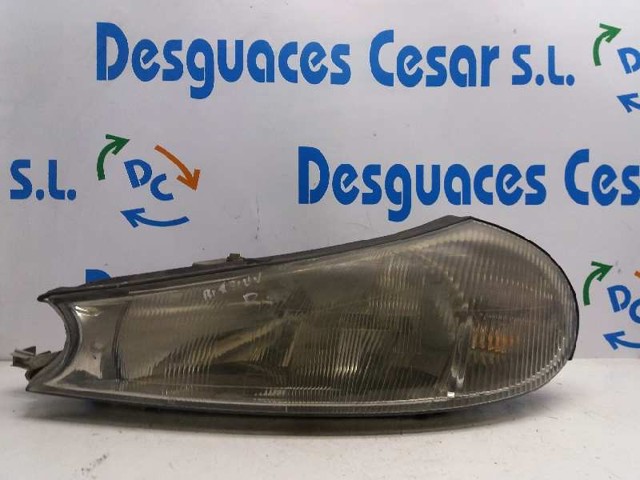 Reflektor lewy 1110520 FORD