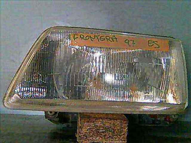 Reflektor lewy 1216001 OPEL