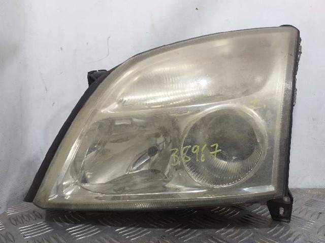 Reflektor lewy 1216121 OPEL