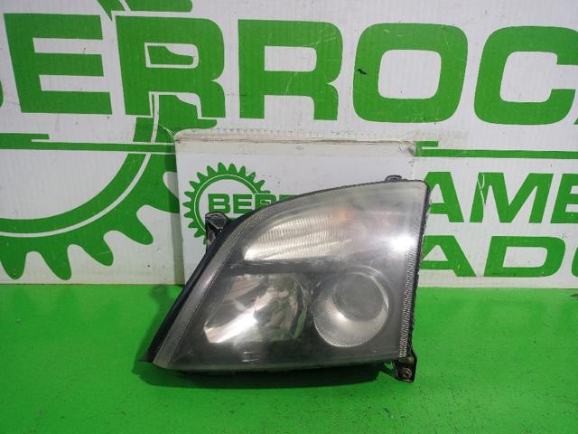 Reflektor lewy 1216129 OPEL