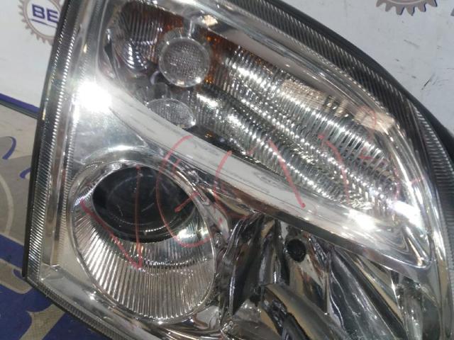 Reflektor prawy 1216130 OPEL