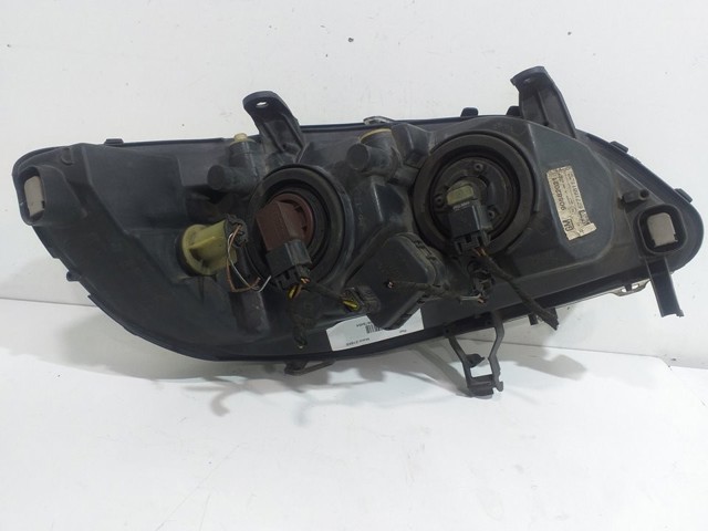 Reflektor lewy 1216277 OPEL