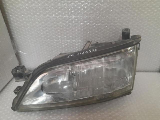 Reflektor lewy 1216527 OPEL