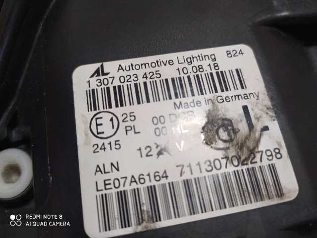 Reflektor lewy 1307023425 VAG