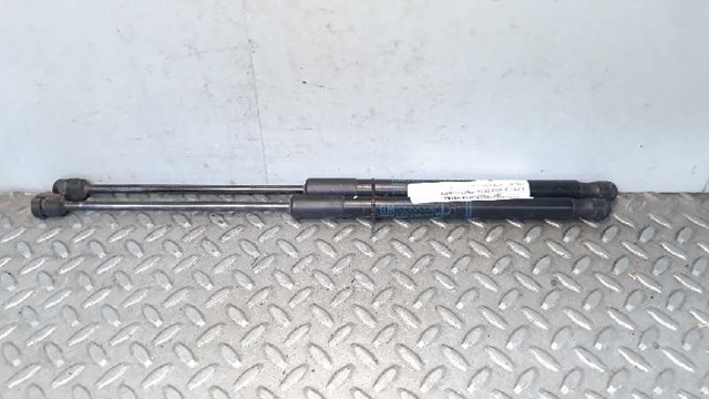 Amortyzator klapy bagażnika (3/5 drzwi-tylnych) 13122695 OPEL