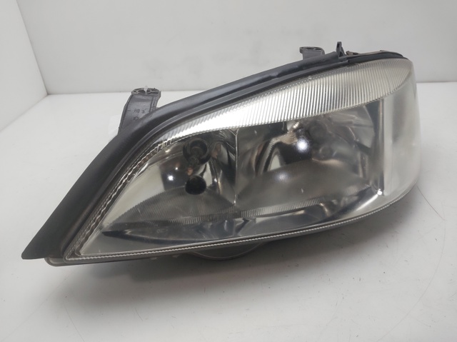 Reflektor lewy 13132455 OPEL