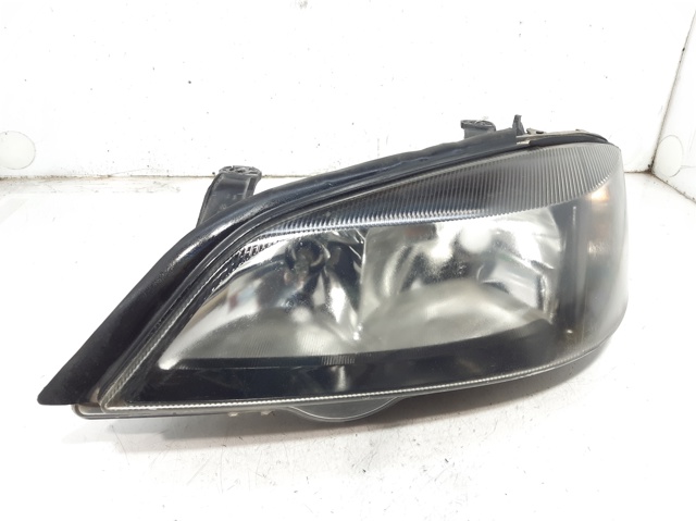 Reflektor lewy 13132459 OPEL