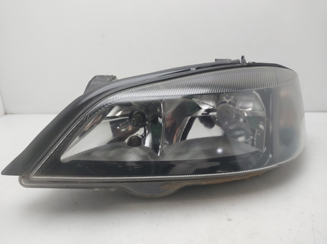 Reflektor lewy 13132459 OPEL
