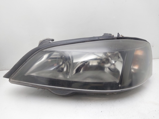 Reflektor lewy 13132459 OPEL