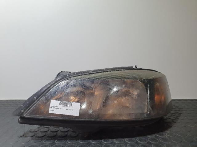 Reflektor lewy 13132459 OPEL