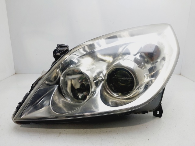 Reflektor lewy 13170915 OPEL