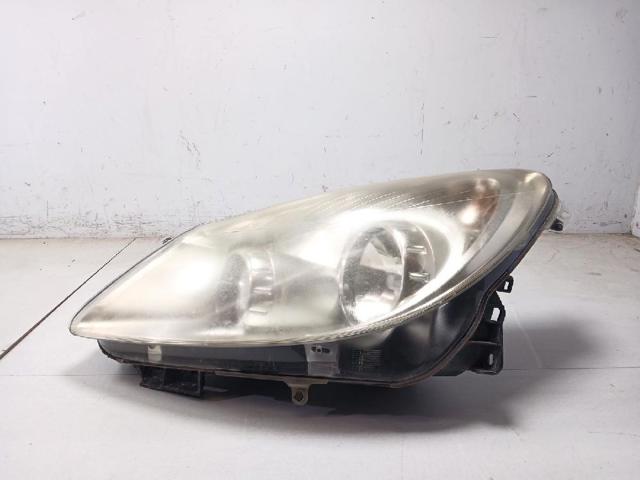 Reflektor lewy 13186381 OPEL