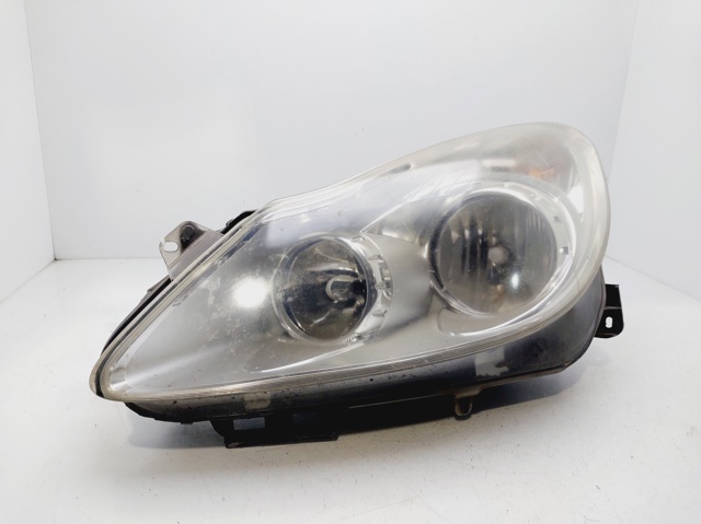 Reflektor lewy 13186381 OPEL