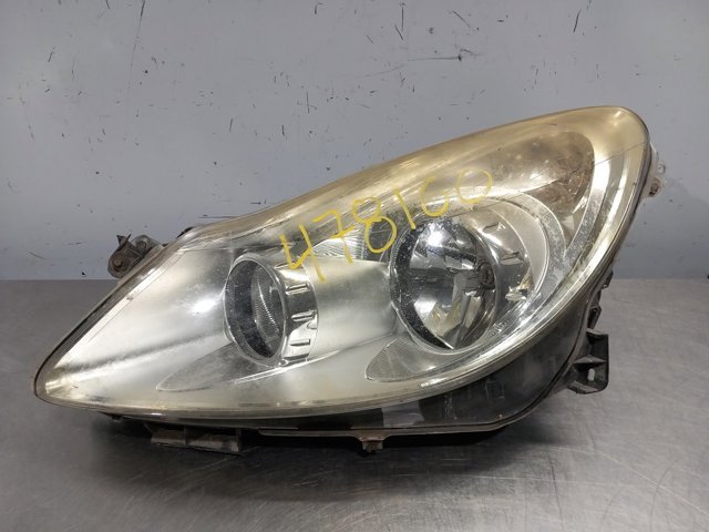 Reflektor lewy 13186381 OPEL