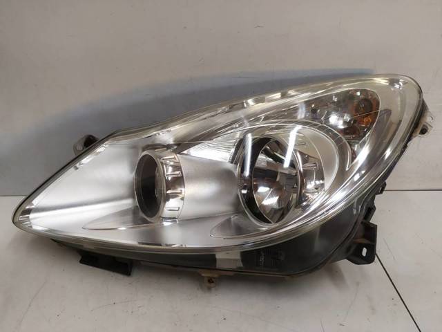 Reflektor lewy 13186381 OPEL