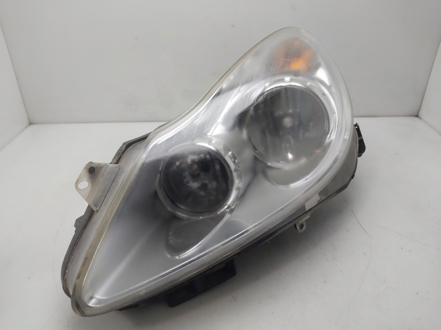 Reflektor lewy 13186381 OPEL