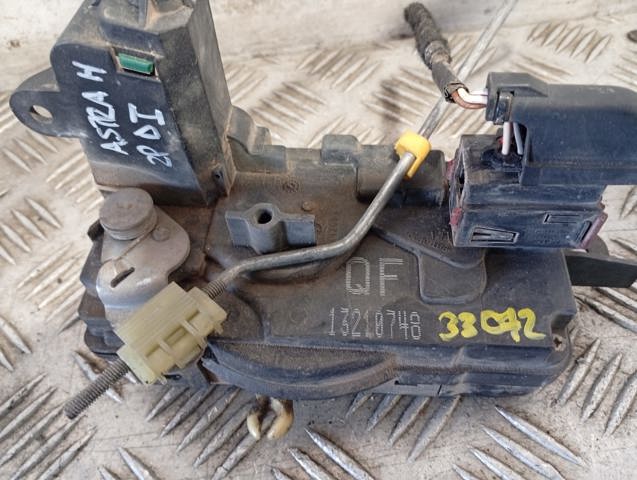 Zamek drzwi przednich lewych 13210748 OPEL