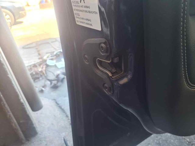 Zamek drzwi przednich lewych 13210767 OPEL