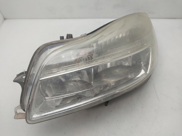 Reflektor lewy 13226782 OPEL