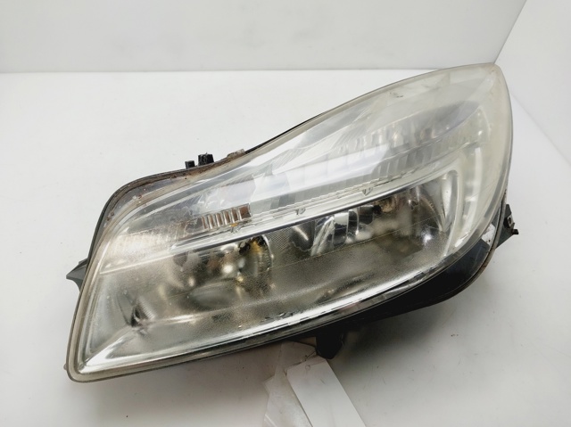 Reflektor lewy 13226782 OPEL