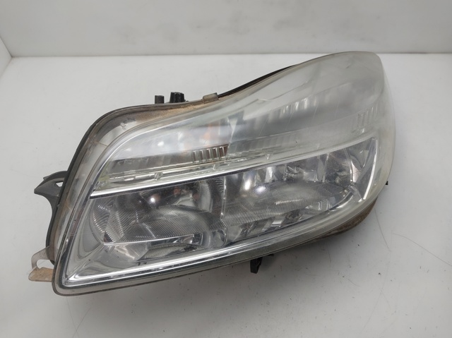 Reflektor lewy 13226782 OPEL