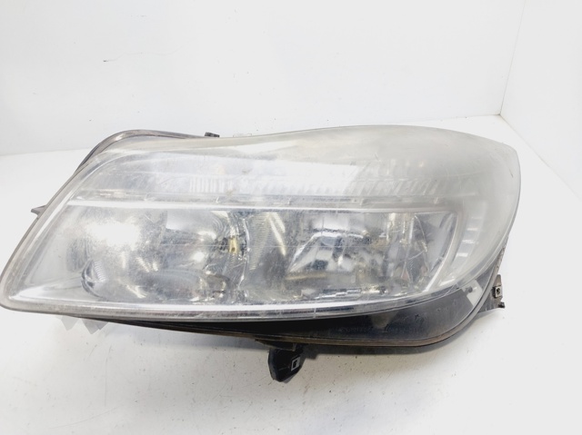 Reflektor lewy 13226782 OPEL