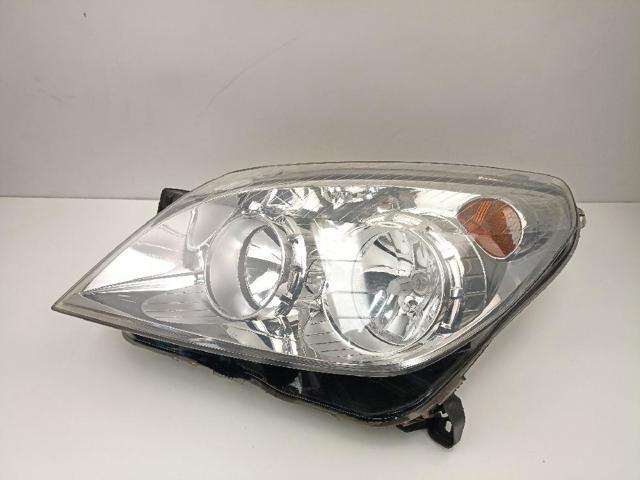 Reflektor lewy 13239288 OPEL