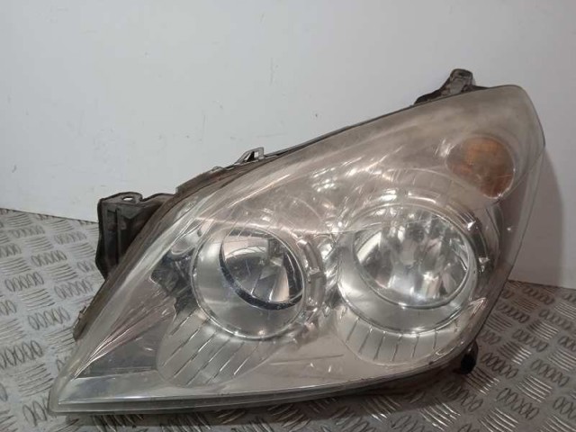 Reflektor lewy 13239288 OPEL