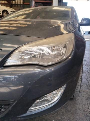 Reflektor lewy 13253646 OPEL