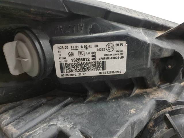 Reflektor lewy 13286612 OPEL