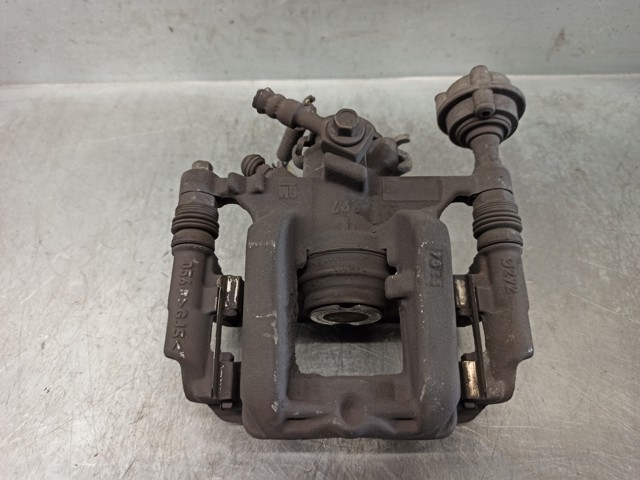 Zacisk hamulcowy tylny lewy 13300863 OPEL