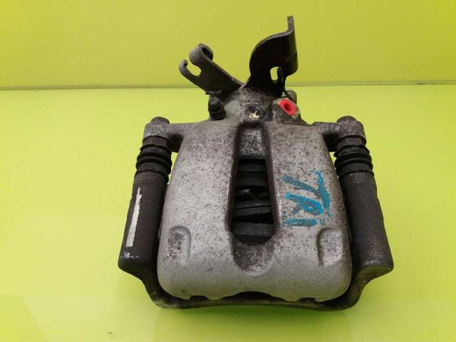 Zacisk hamulcowy tylny lewy 13343569 OPEL